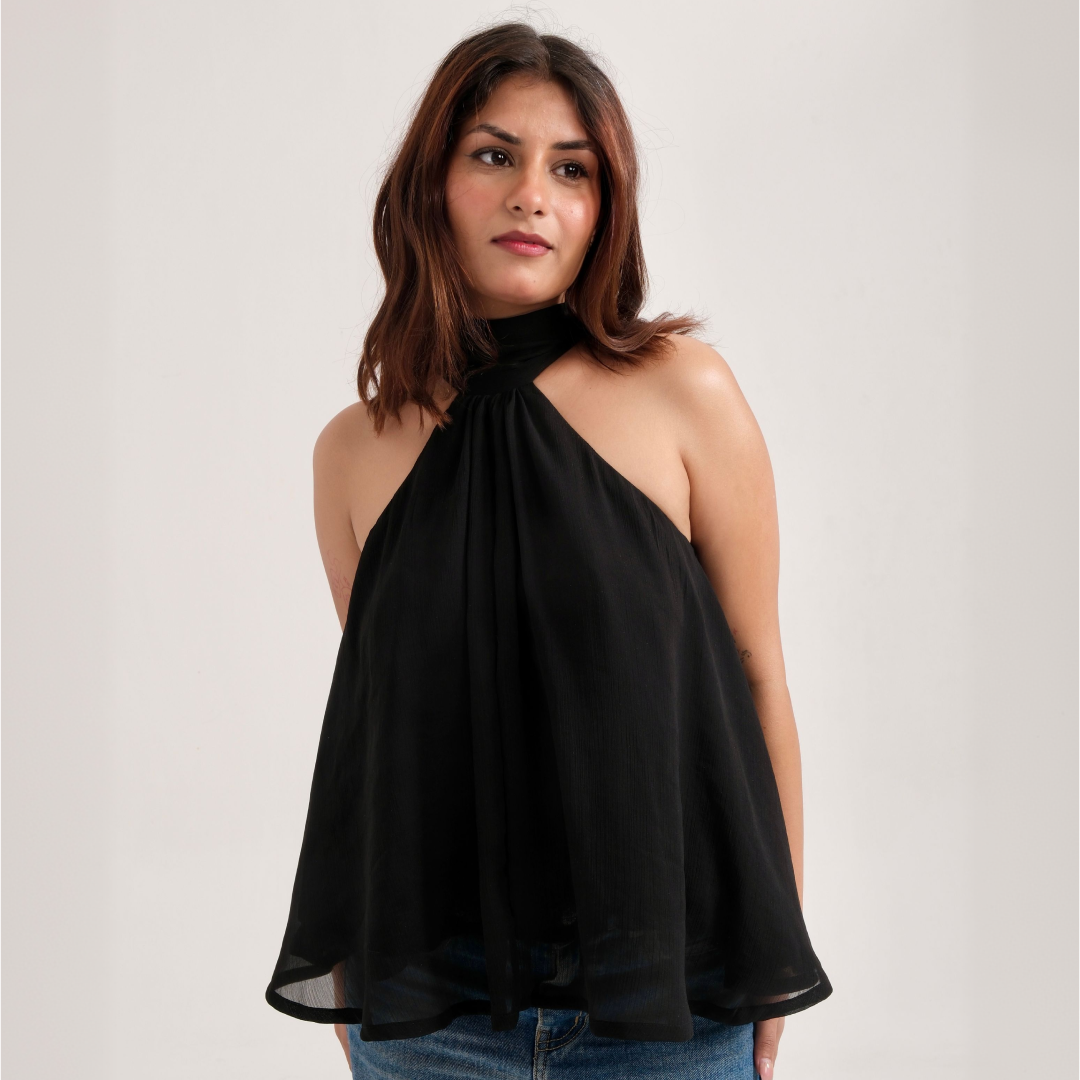 Women's tops and shirts collection featuring elevated essentials and refined silhouettes by YUMIS.