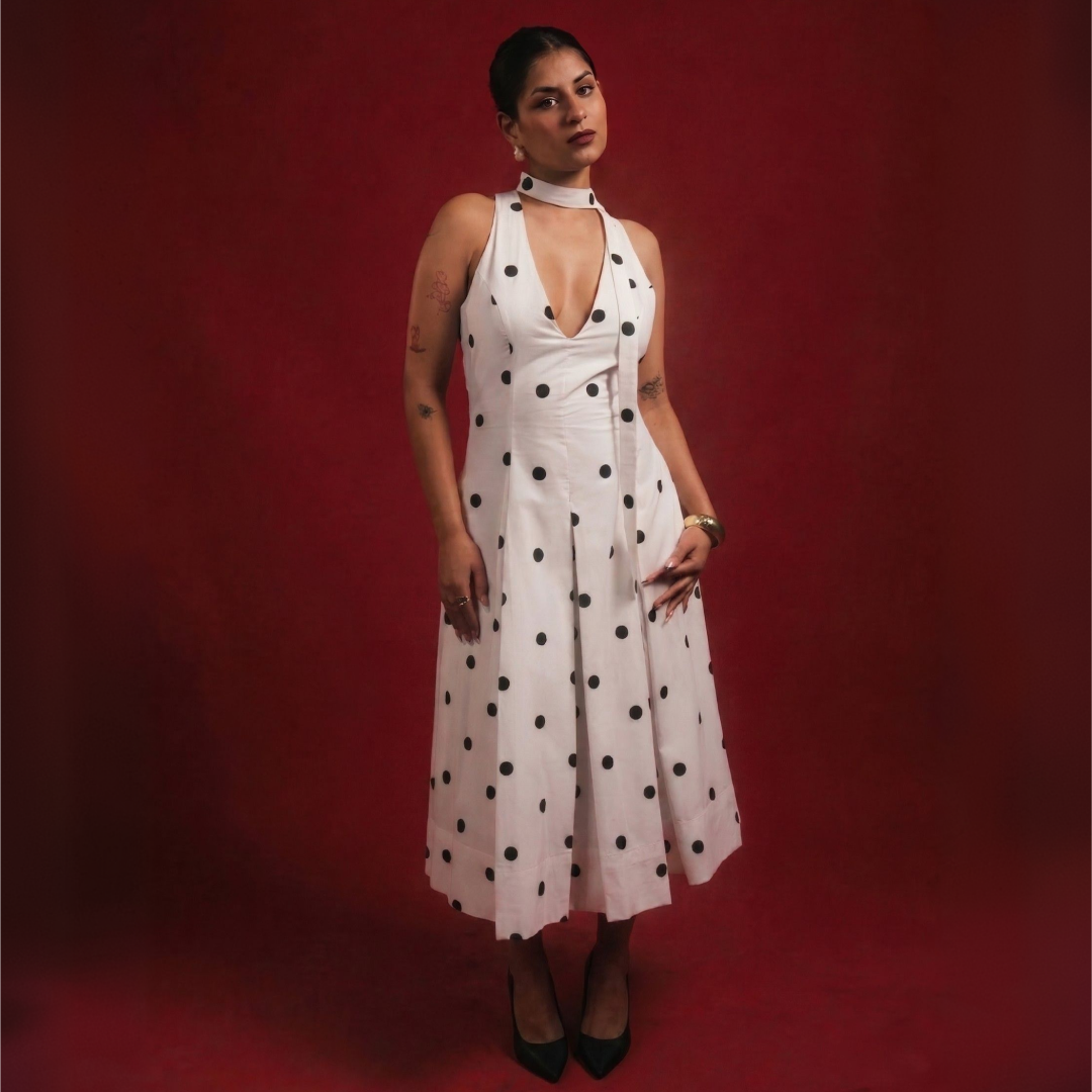 Women's dresses and jumpsuits featuring midi dresses, occasion wear, and contemporary fashion by YUMIS.