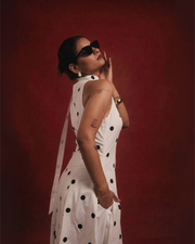 Close-up of DOMINADOT white polka dot dress showing scarf neckline and V-neck detail – YUMIS