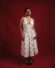 DOMINADOT white polka dot midi dress with scarf neckline and box-pleated skirt – front view – YUMIS