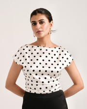 POLKAMUSE TOP ivory polka dot satin boat-neck top with ruched side detail – front view – YUMIS