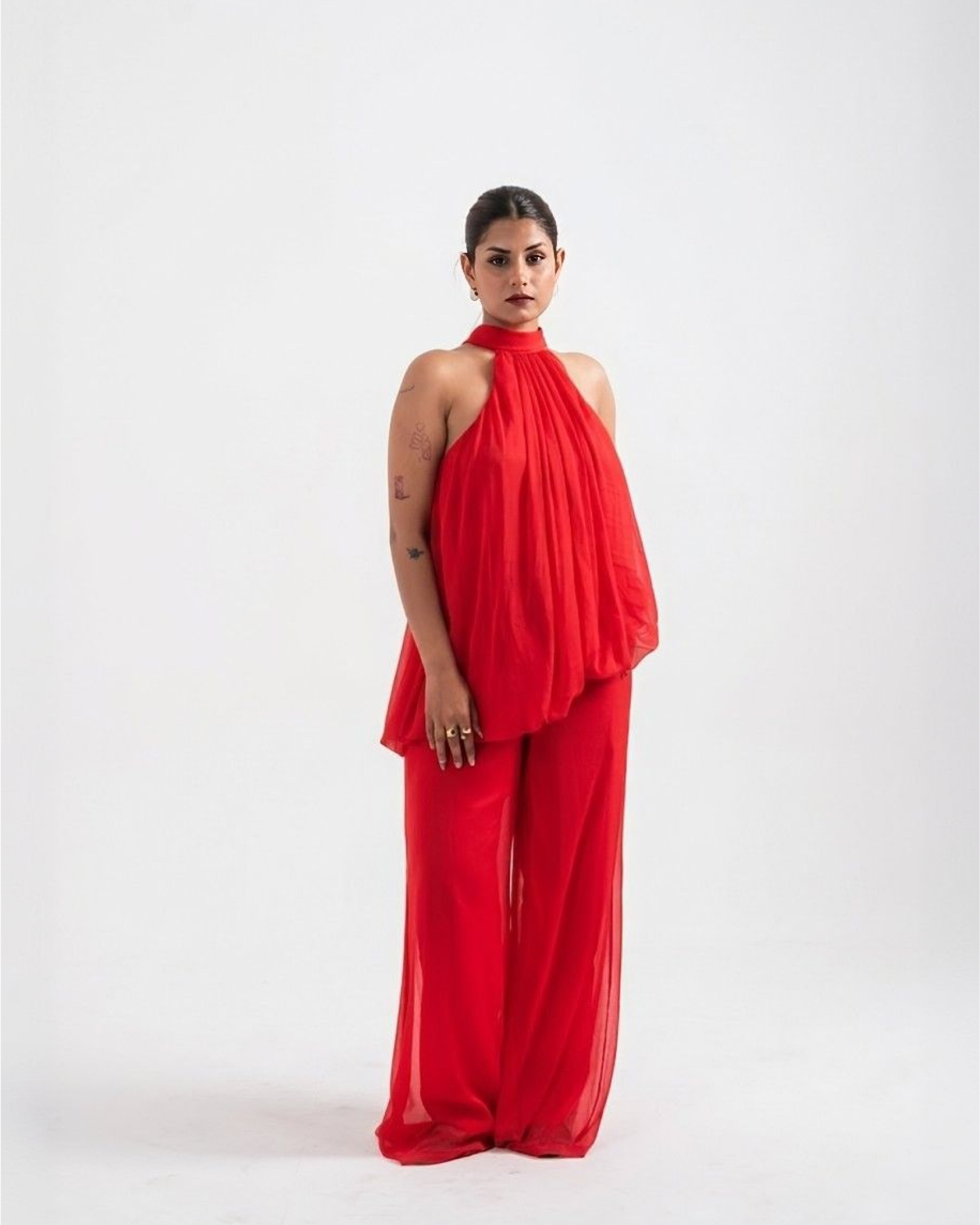WHISPER red chiffon halter jumpsuit with asymmetric drape and wide leg – full front view – YUMIS